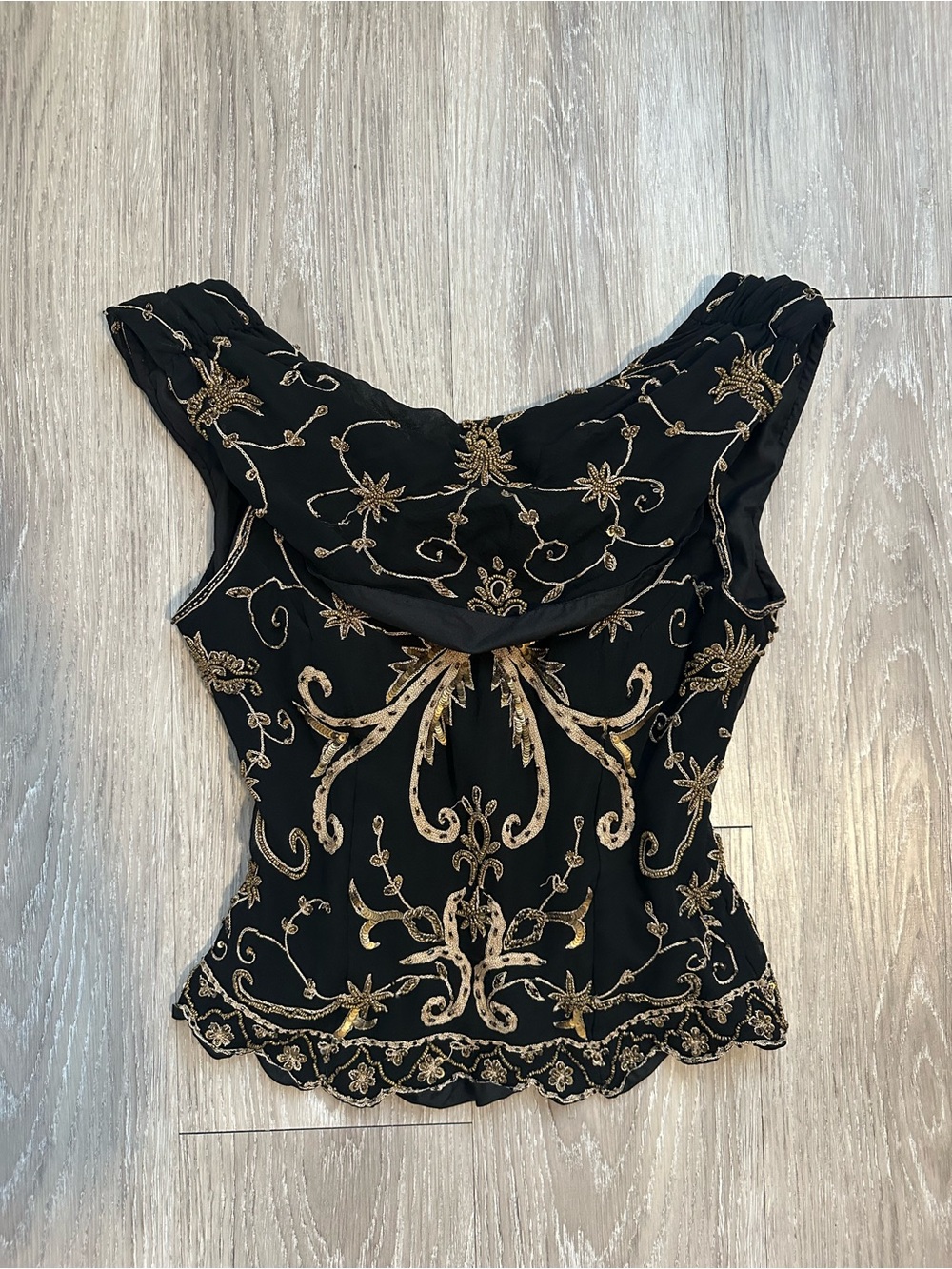 Embroidered Black Cap-Sleeve Blouse with Gold Accents